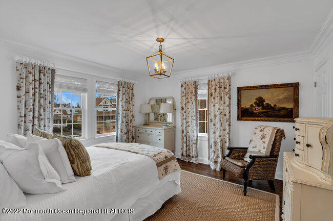 312 Essex Avenue Spring Lake, NJ 07762 - Photo 19 of 29 a bedroom with a bed couch and window