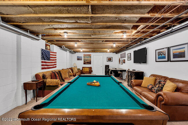 312 Essex Avenue Spring Lake, NJ 07762 - Photo 27 of 29 a room with furniture pool table flat screen tv and couches