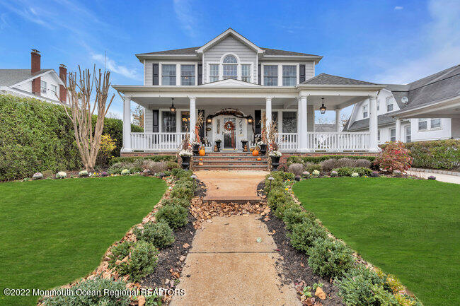 312 Essex Avenue Spring Lake, NJ 07762 - Photo 4 of 29 a front view of a house with a yard