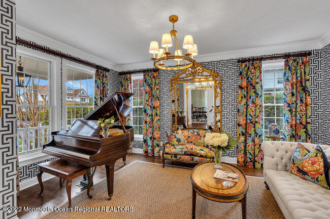 312 Essex Avenue Spring Lake, NJ 07762 - Photo 5 of 29 a room with lots of furniture and a chandelier