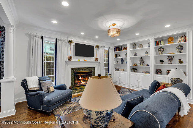 312 Essex Avenue Spring Lake, NJ 07762 - Photo 7 of 29 a living room with furniture and a fireplace