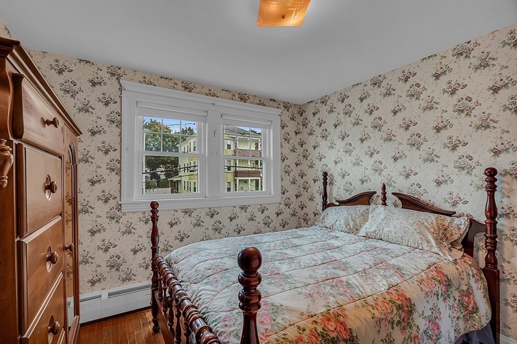 15 Halmstad Street Worcester, MA 01607 - Photo 17 of 25 a bedroom with a bed and a window