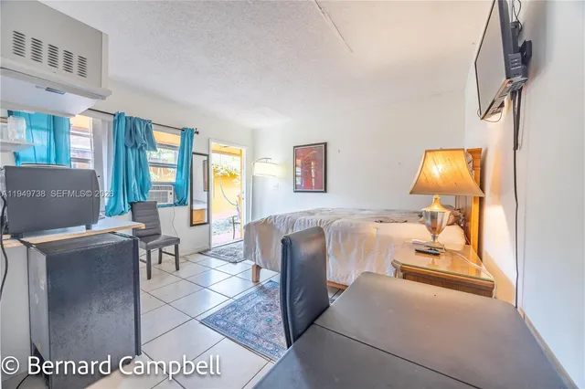 a view of a living room with a rug