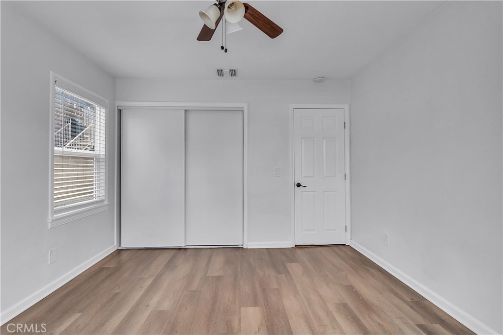 7552 11th Street Buena Park, CA 90621 - Photo 13 of 23 wooden floor in an empty room