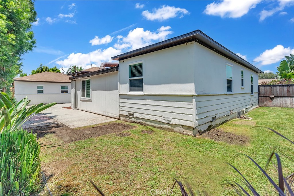 7552 11th Street Buena Park, CA 90621 - Photo 22 of 23 a view of a house with a yard