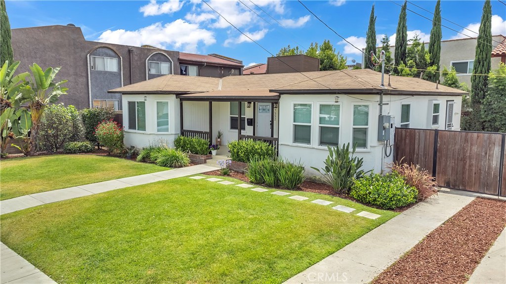 7552 11th Street Buena Park, CA 90621 - Photo 3 of 23 a front view of a house with garden