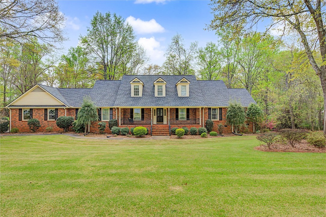 105 Hamilton Drive Anderson, SC 29621 - Photo 1 of 49 This classic brick residence features dormer windows and a welcoming front porch set on an expansive green lawn.
