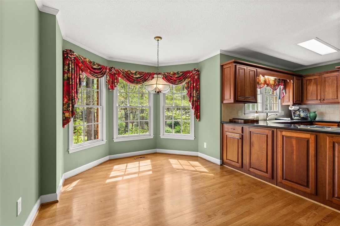 105 Hamilton Drive Anderson, SC 29621 - Photo 18 of 49 This inviting space features abundant natural light, creating an ideal setting for casual dining.