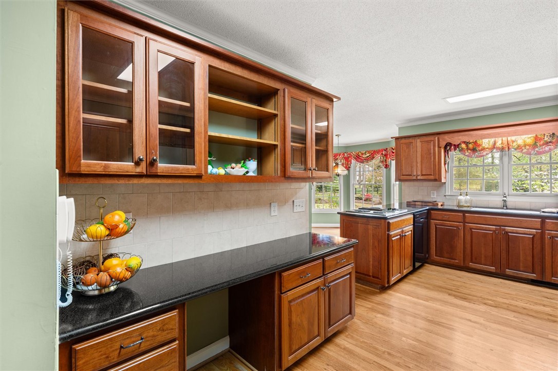 105 Hamilton Drive Anderson, SC 29621 - Photo 24 of 49 This spacious kitchen offers abundant cabinetry and elegant countertops.