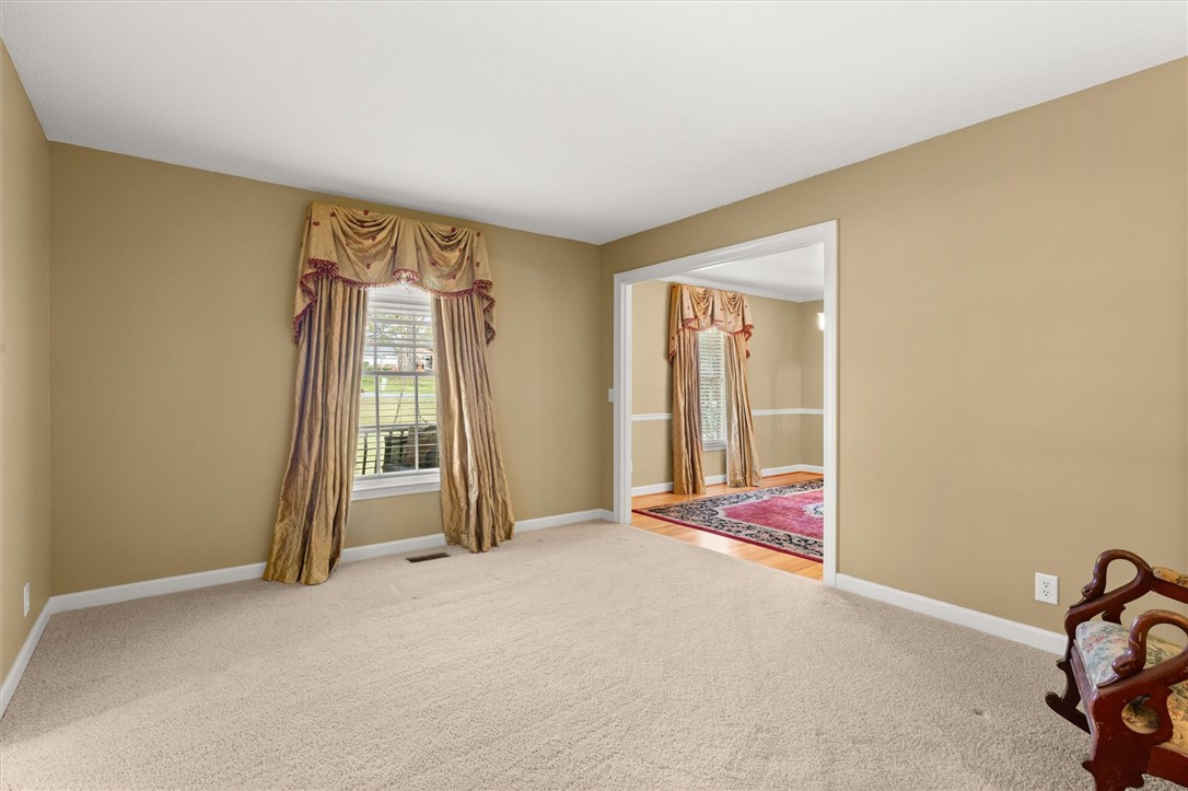 105 Hamilton Drive Anderson, SC 29621 - Photo 29 of 49 Warm and inviting living space with carpeted floors, ready for personal touches.