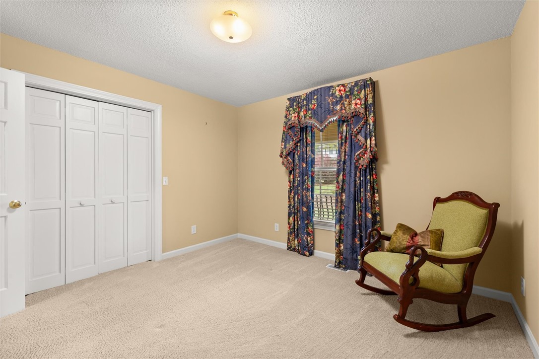 105 Hamilton Drive Anderson, SC 29621 - Photo 37 of 49 This inviting bedroom features soft carpeting, ample closet space, and a bright window.