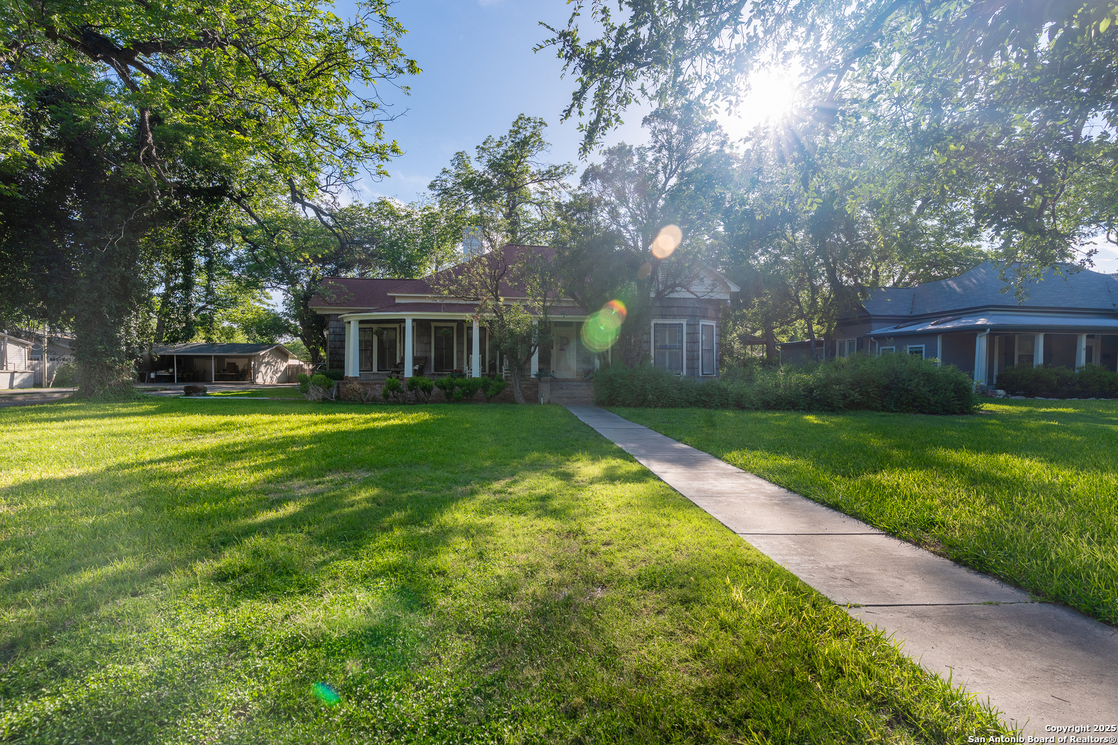 529 North High Street Uvalde, TX 78801 - Photo 2 of 37 a view of house that has a yard