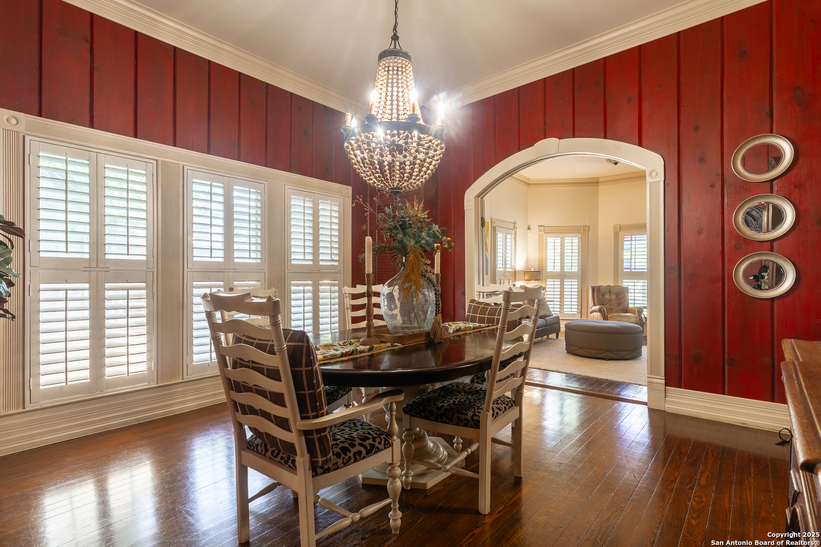 529 North High Street Uvalde, TX 78801 - Photo 8 of 37 a view of a dining room with furniture and wooden floor