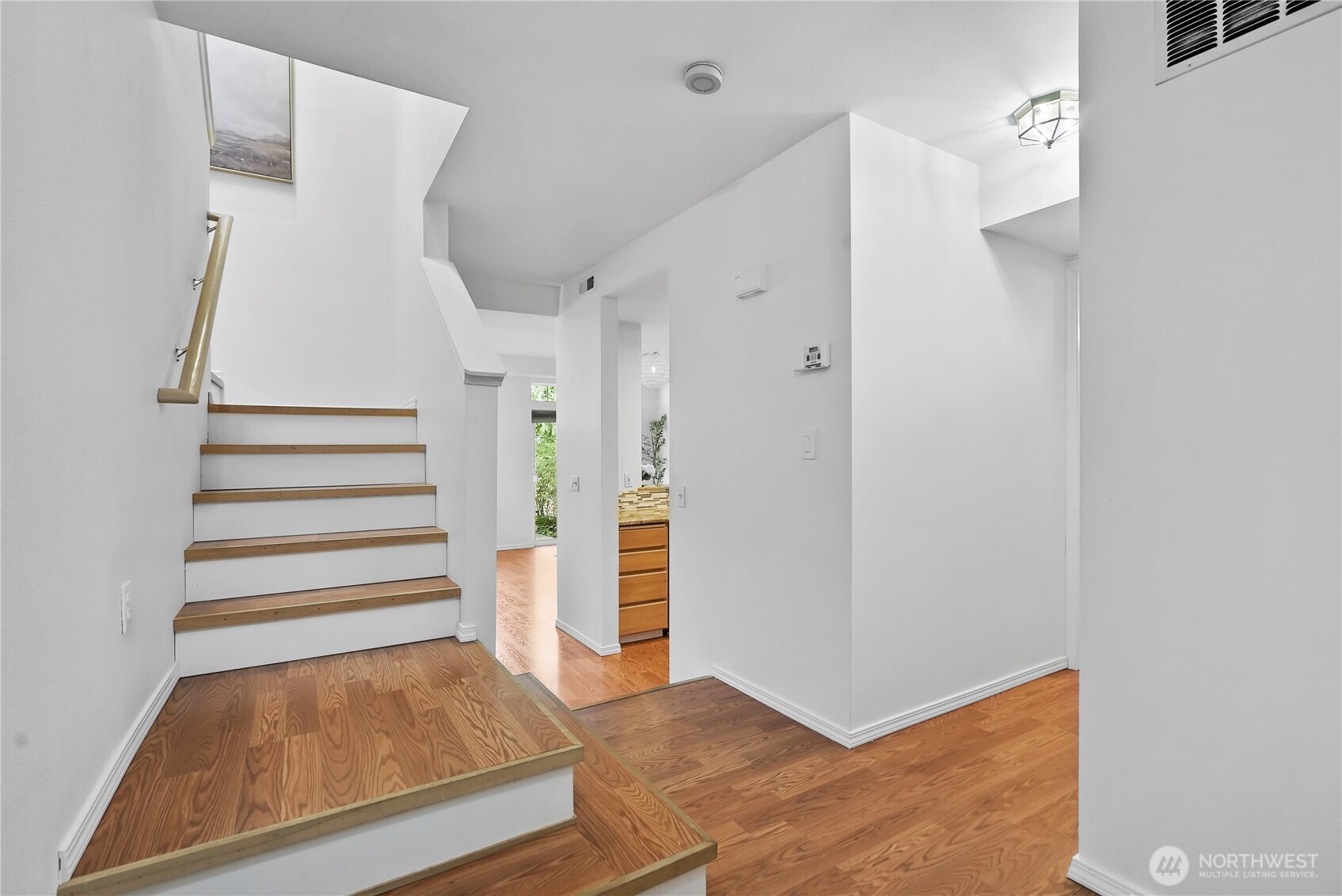 14714 53rd Avenue West, Unit 116 Edmonds, WA 98026 - Photo 13 of 30 a view of entryway with furniture and wooden floor