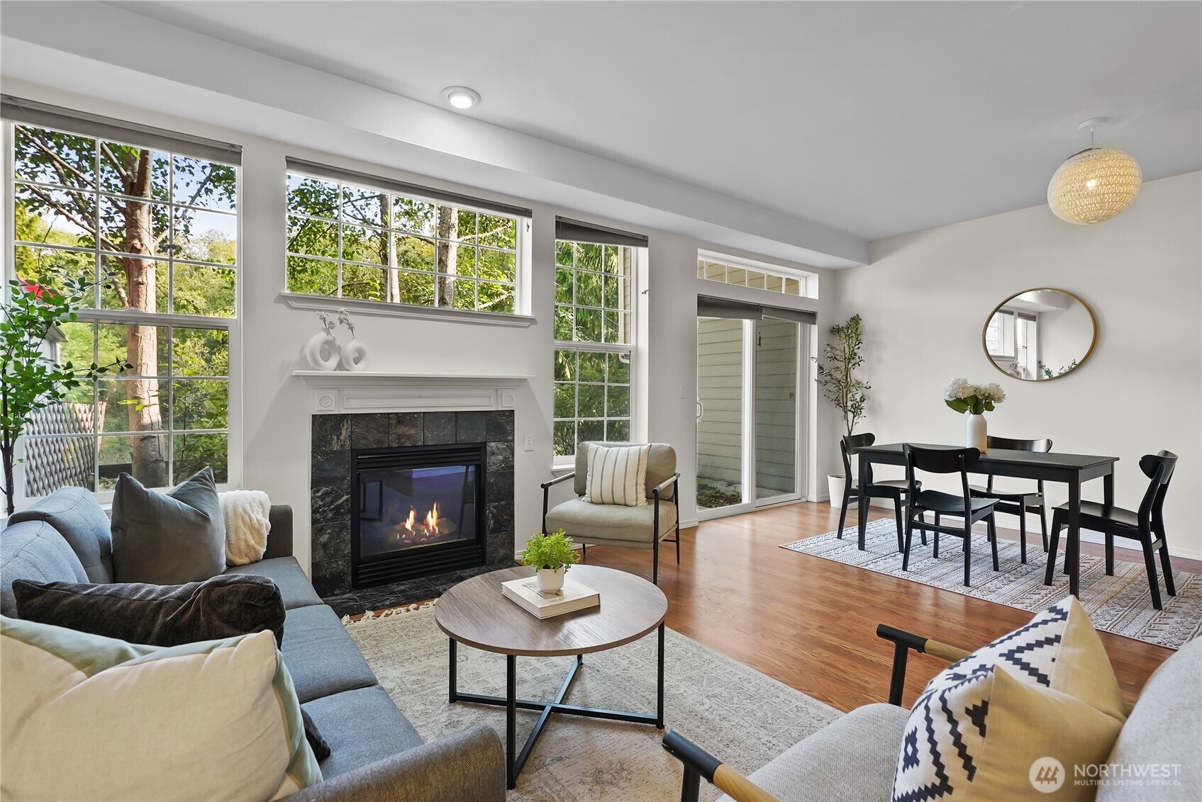 14714 53rd Avenue West, Unit 116 Edmonds, WA 98026 - Photo 9 of 30 a living room with furniture and a fireplace