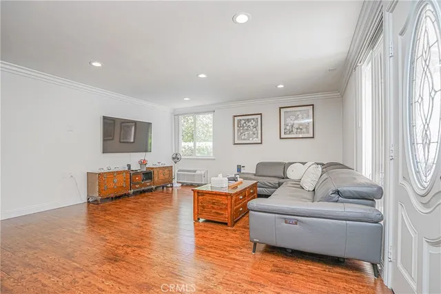 a view of a livingroom with furniture and a porch