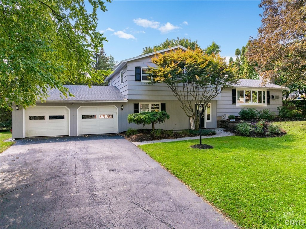 7646 Farmington Road Manlius, NY 13104 - Photo 2 of 47 NESTLED IN THE MUCH THOUGHT AFTER STONELEDGE HILLS