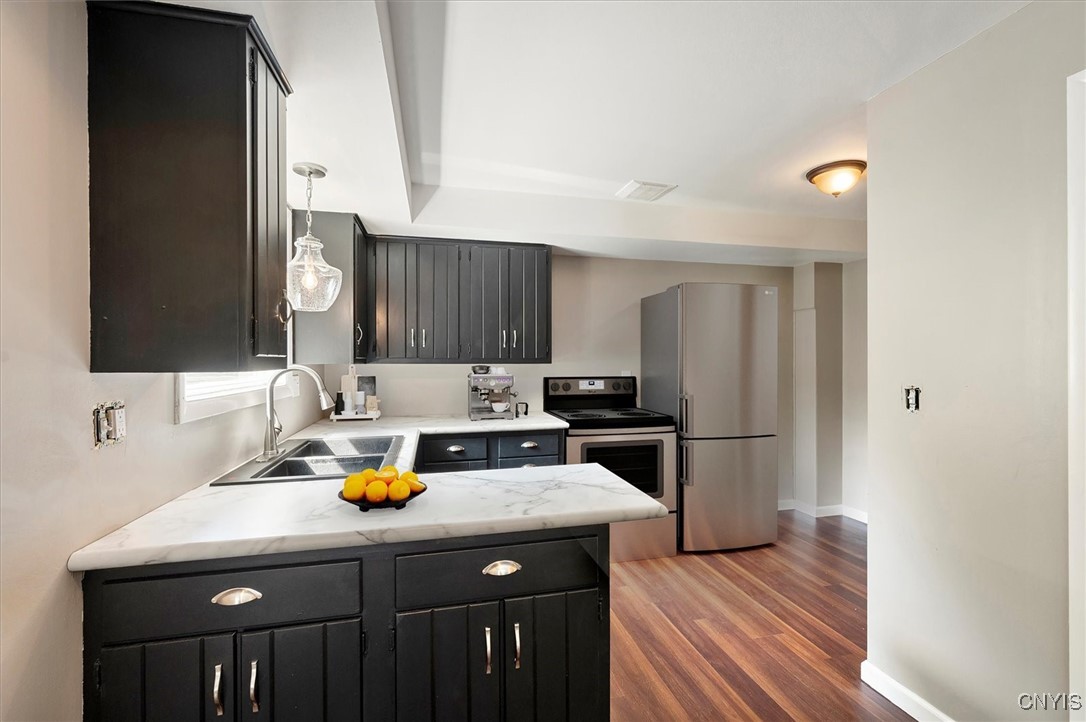 7646 Farmington Road Manlius, NY 13104 - Photo 34 of 47 VIRTUALLY STAGED WITH A REFRIGERATOR AND FULL SIZE