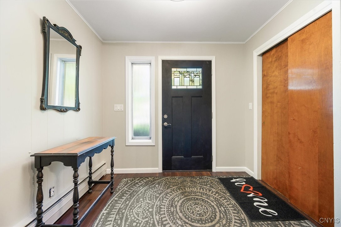 7646 Farmington Road Manlius, NY 13104 - Photo 4 of 47 Entranceway features new lighting and a new and fr