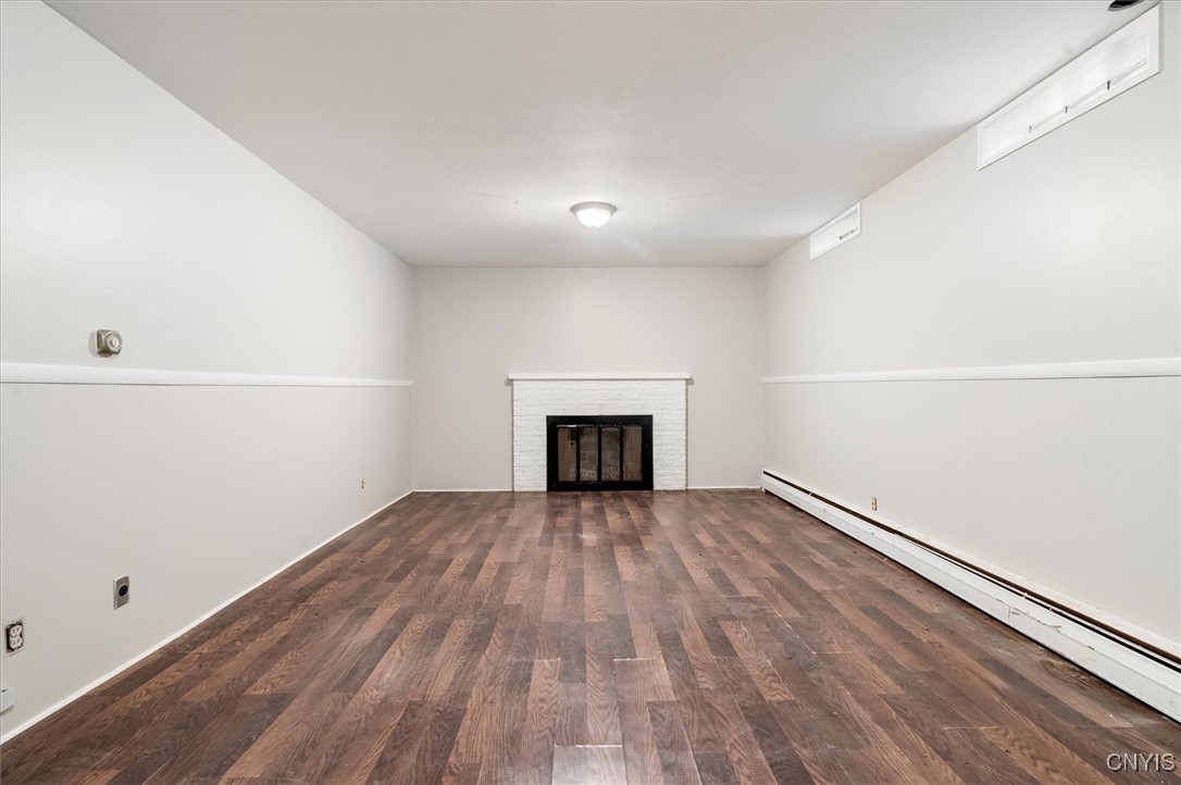 7646 Farmington Road Manlius, NY 13104 - Photo 41 of 47 Finished part of the basement with with wood float