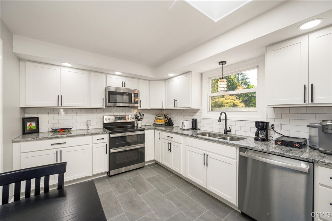 7646 Farmington Road Manlius, NY 13104 - Photo 6 of 47 RECENTLY REMODELED KITCHEN Boasts Thomasville Fine