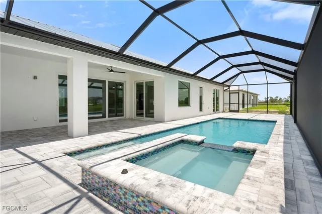 a view of a house with swimming pool