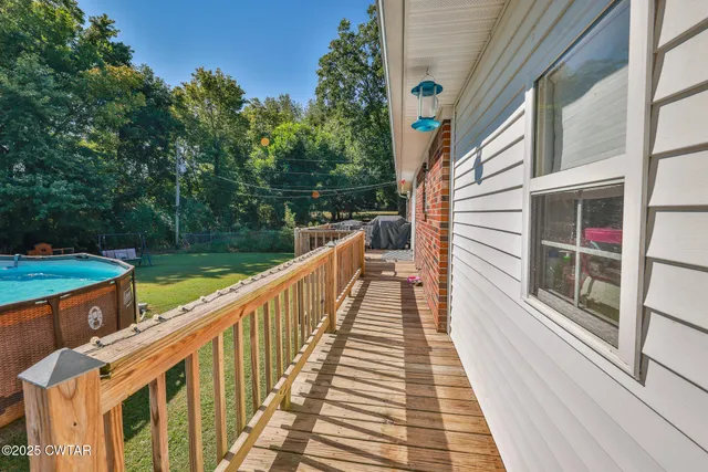 a patio with water view fountain and ocean view