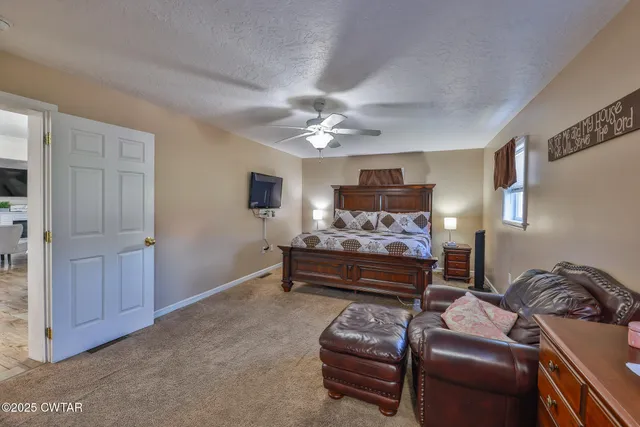 a bathroom with a sink toilet and mirror