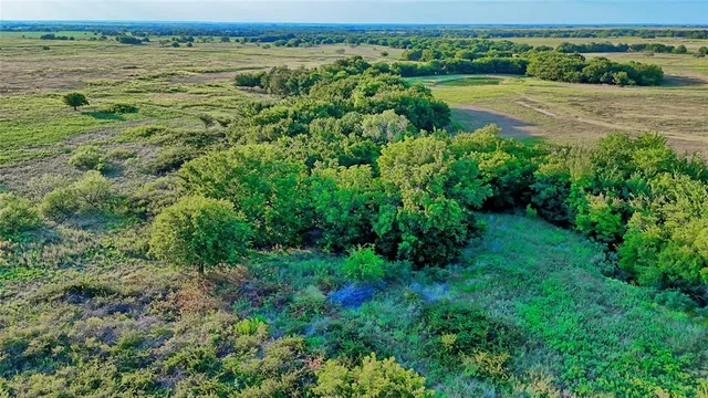 a view of a lake with outdoor space