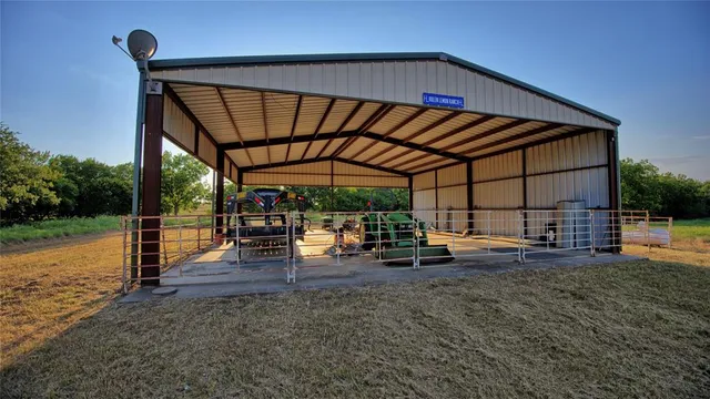 a view of a backyard with sitting area