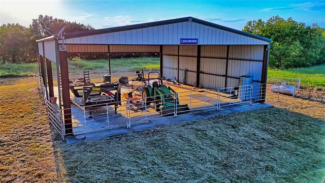 a view of a town with large trees
