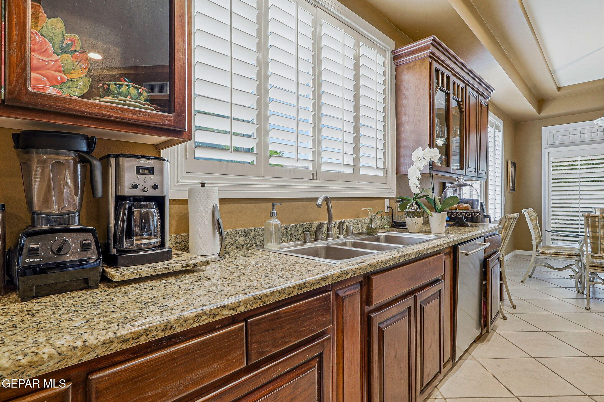 5806 Diamond Point Circle El Paso, TX 79912 - Photo 14 of 61 a kitchen with stainless steel appliances granite countertop a sink and a counter space