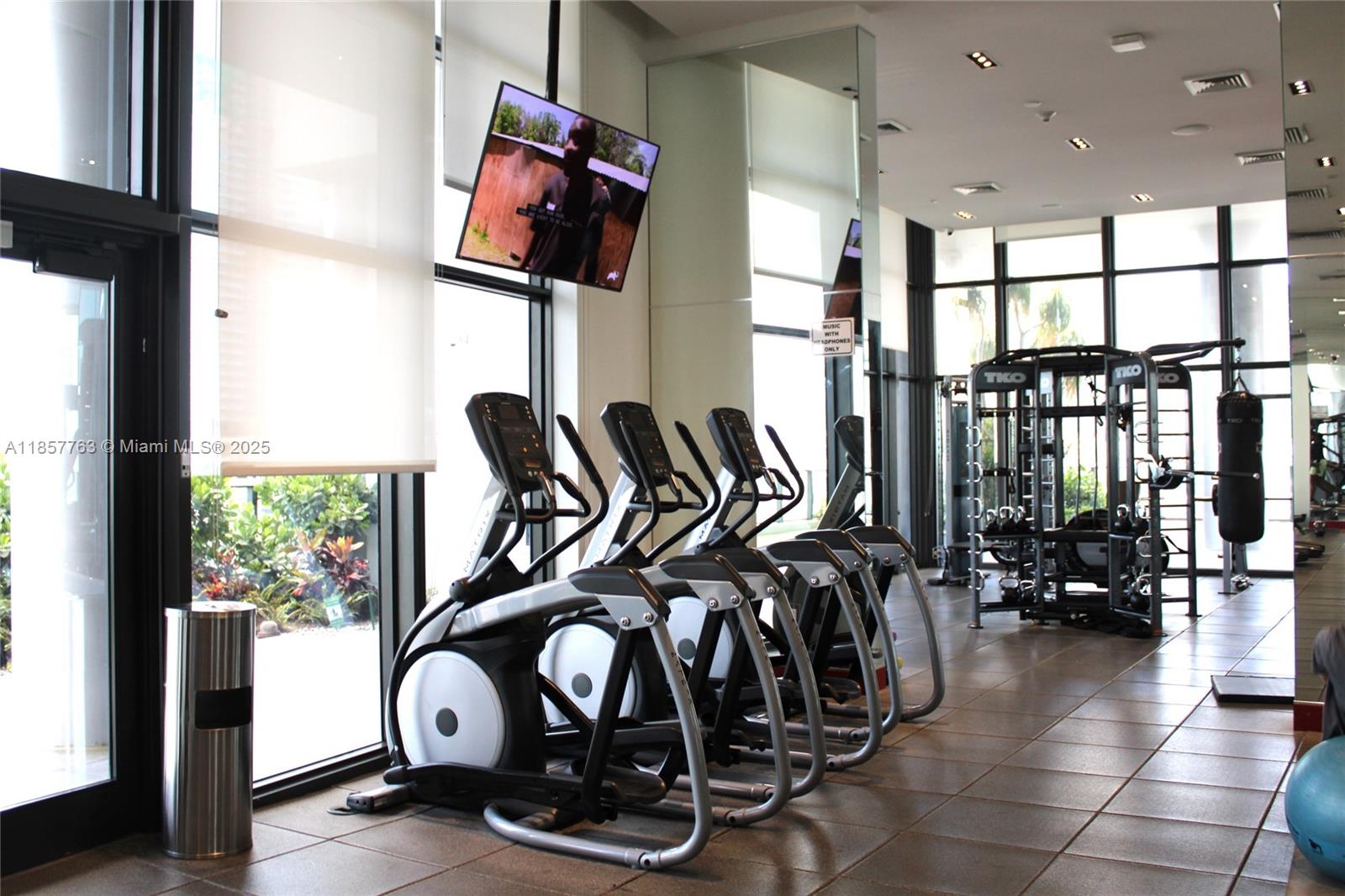 Omni Miami, FL 33132 - Photo 11 of 19 a view of a room with gym equipment
