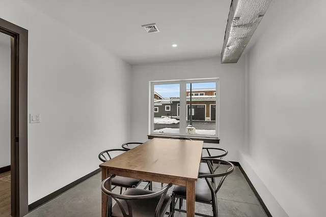 a view of a room with racks on the wall