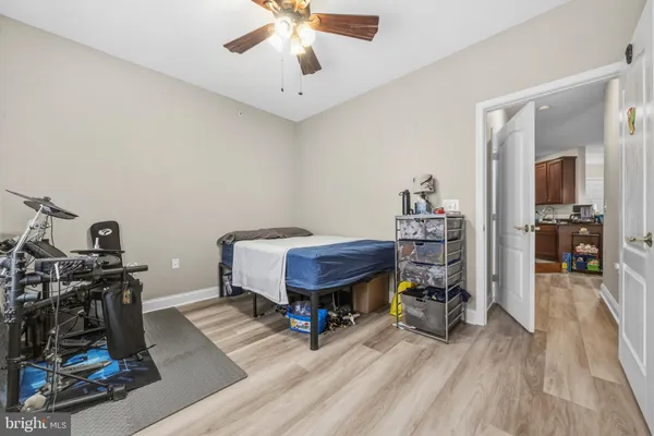 a room with furniture and wooden floor