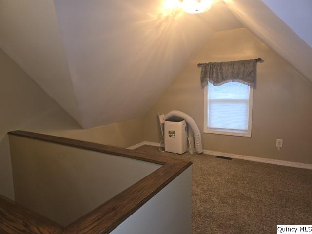 303 North Washington Street Carthage, IL 62321 - Photo 14 of 25 a bathroom with a sink and vanity