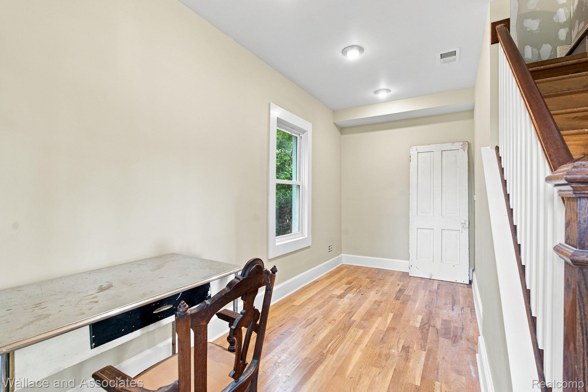 5949 Roach Road Croswell, MI 48422 - Photo 32 of 48 Hardwood flooring throughout, recessed lighting, and a window providing natural light