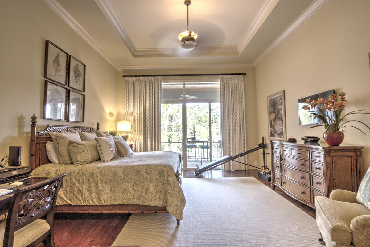 17106 Bay Street Jupiter, FL 33477 - Photo 12 of 52 a living room with furniture hardwood floor and a window