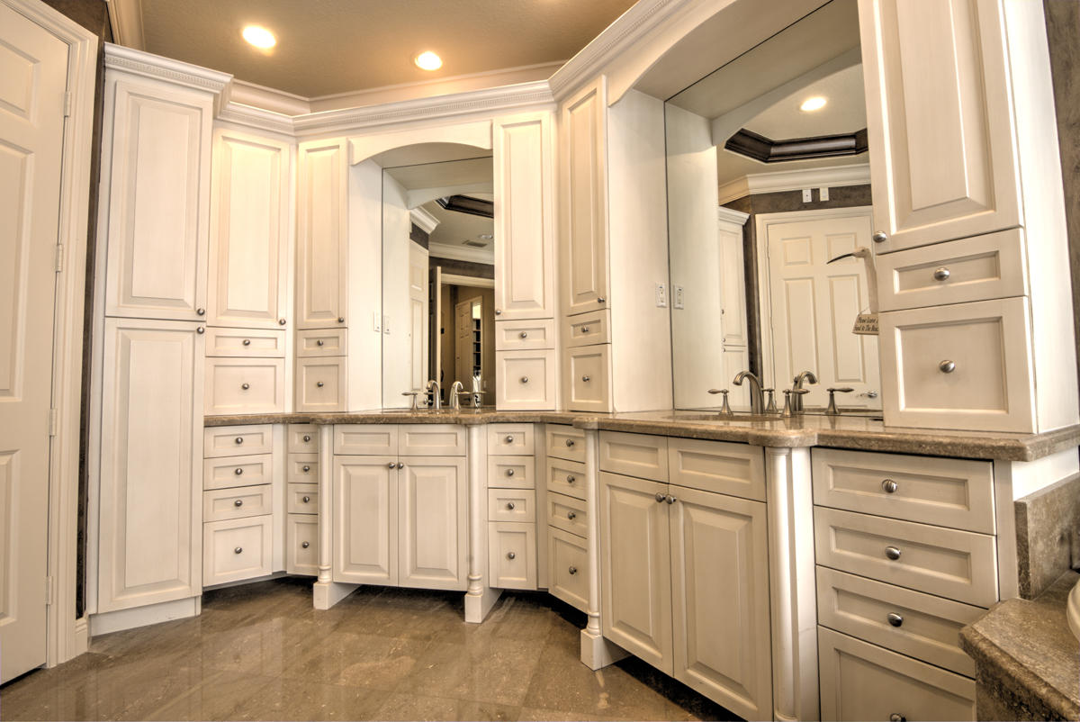 17106 Bay Street Jupiter, FL 33477 - Photo 14 of 52 a view of granite countertop cabinets and a wooden floor