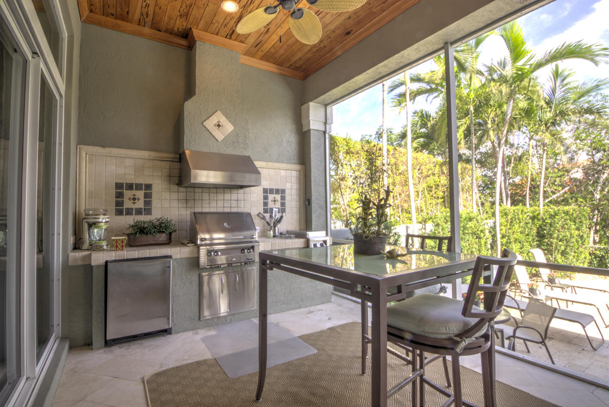 17106 Bay Street Jupiter, FL 33477 - Photo 28 of 52 a view of a dining room with furniture window and outside view