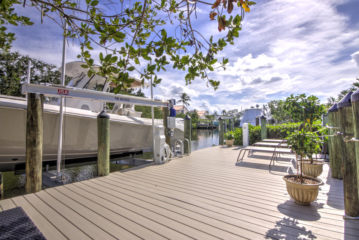 17106 Bay Street Jupiter, FL 33477 - Photo 34 of 52 swimming pool view with a seating space