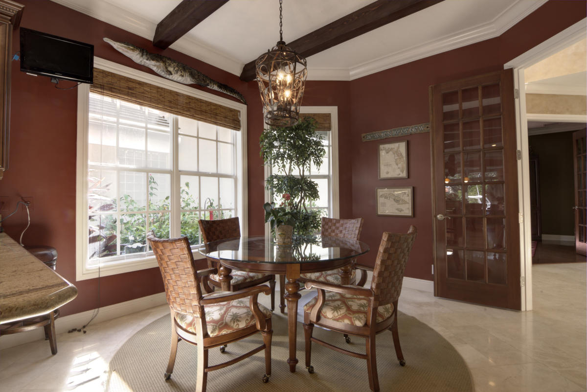17106 Bay Street Jupiter, FL 33477 - Photo 4 of 52 a view of a dining room with furniture and window