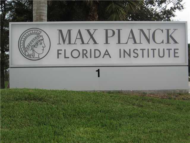 17106 Bay Street Jupiter, FL 33477 - Photo 42 of 52 a view of a sign in a park