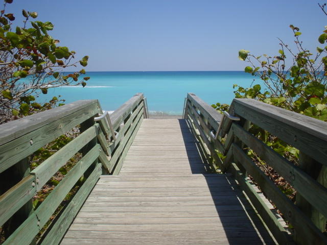 17106 Bay Street Jupiter, FL 33477 - Photo 46 of 52 a view of a balcony with wooden floor