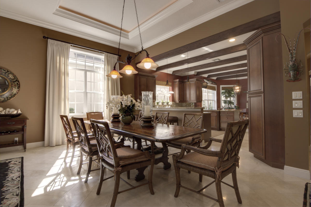17106 Bay Street Jupiter, FL 33477 - Photo 8 of 52 a dining room with furniture and window