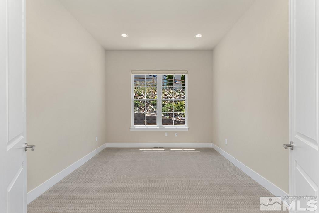 4000 Whispering Pine Loop Reno, NV 89519 - Photo 15 of 26 an empty room with a window