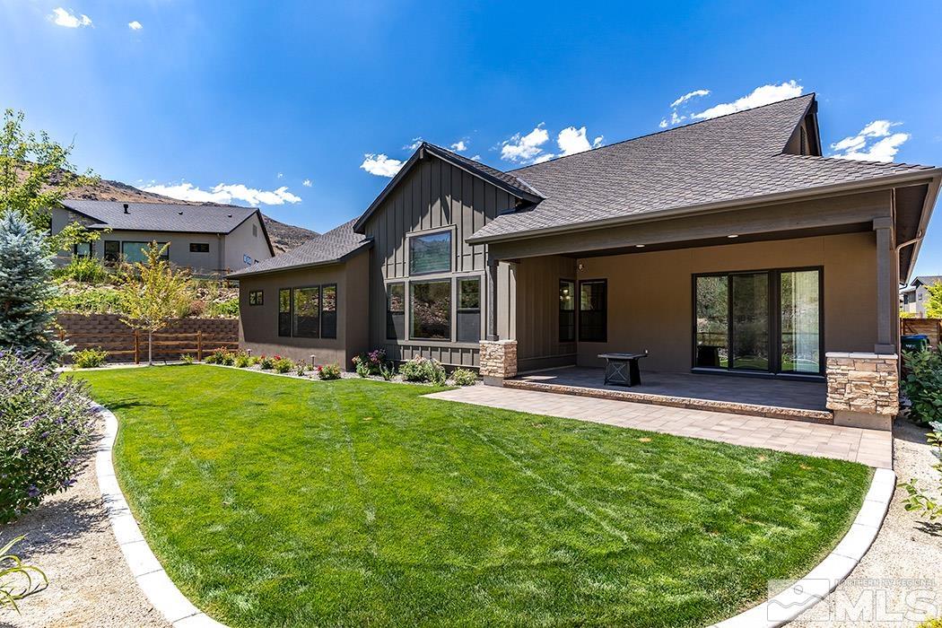 4000 Whispering Pine Loop Reno, NV 89519 - Photo 23 of 26 a view of a house with backyard porch and sitting area