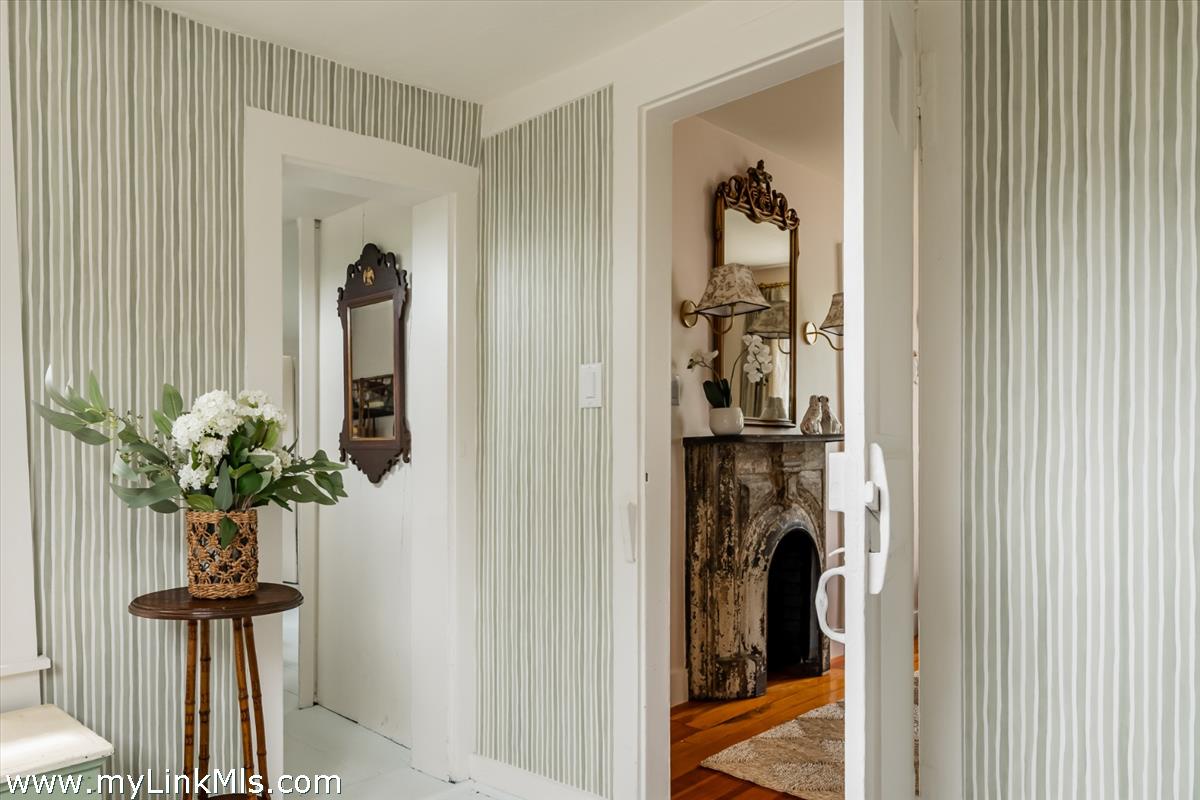 10 Centre Street Nantucket, MA 02554 - Photo 6 of 43 a view of a hallway with a flower pot