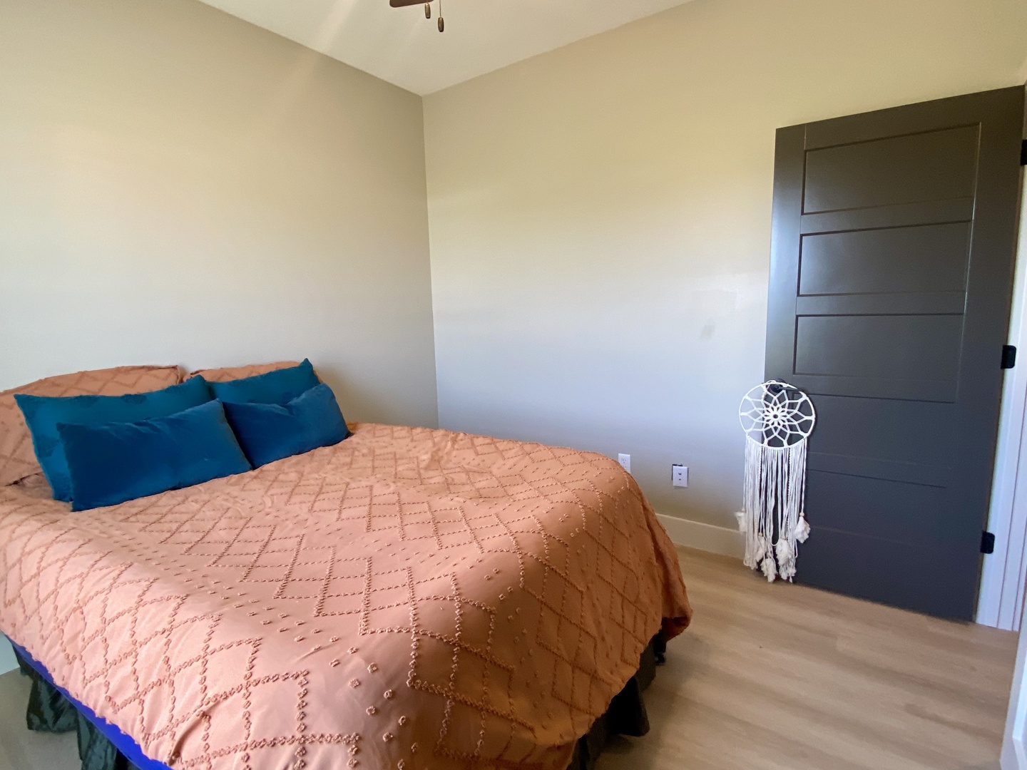 1619 Peppermill Lane Champaign, IL 61822 - Photo 20 of 31 a bedroom with a bed and a chandelier