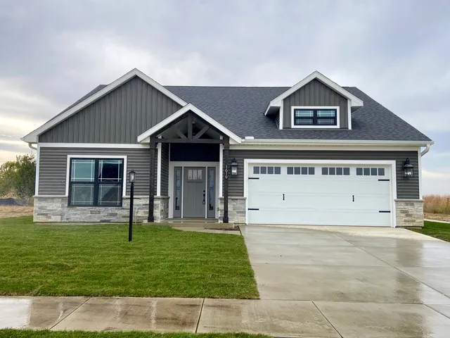 a view of a house with a yard